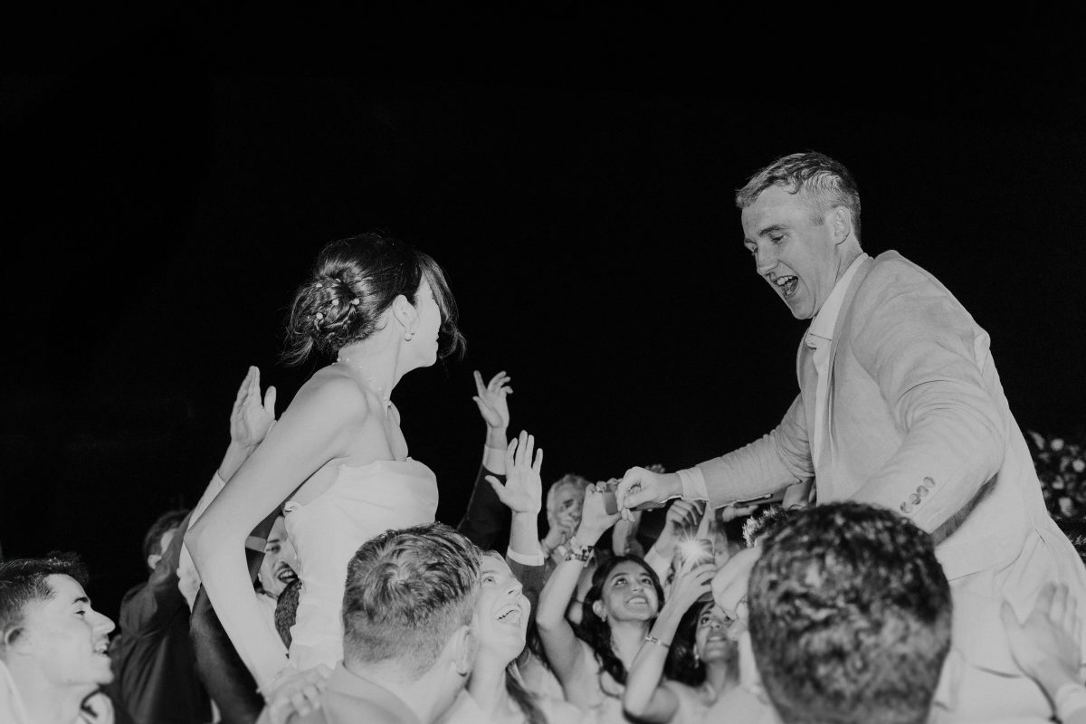 Couple celebrating during their wedding reception in Mexico